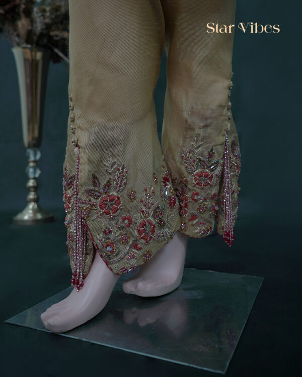 Light golden 3-piece Khadi net outfit with zardozi, dabka, resham, crystal, cut dana, sitara work, featuring tie-dye dupatta and maroon crystal tassel trousers – Star Vibes Pakistani party wear.
