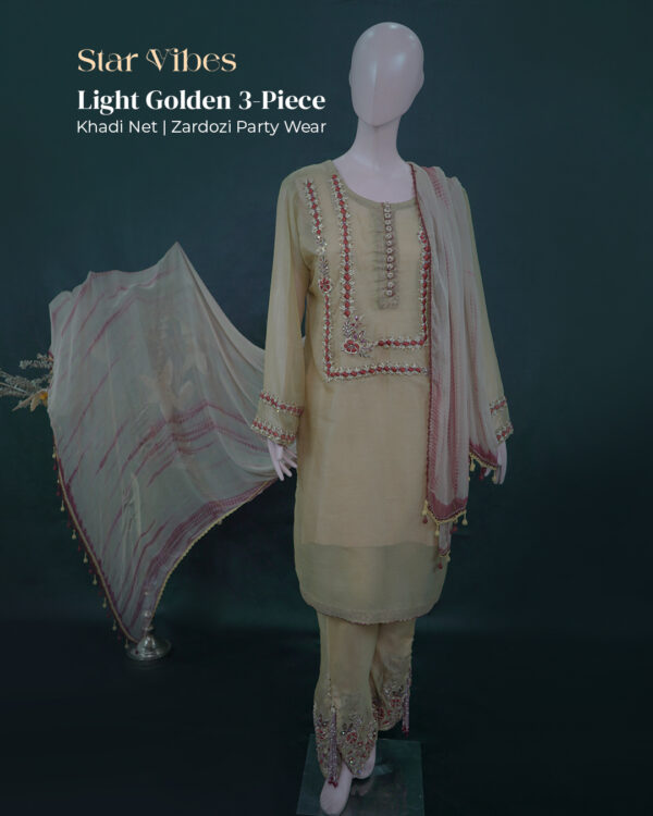 Light golden 3-piece Khadi net outfit with zardozi, dabka, resham, crystal, cut dana, sitara work, featuring tie-dye dupatta and maroon crystal tassel trousers – Star Vibes Pakistani party wear.